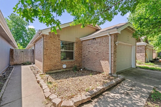 840 Eagles Way, Leander, TX 78641 - view of front of house featuring brick siding, concrete driveway, and an attached garage