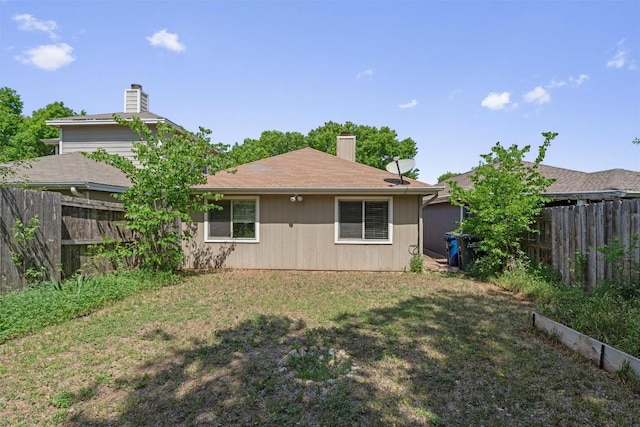 840 Eagles Way, Leander, TX 78641 - back of house featuring a chimney