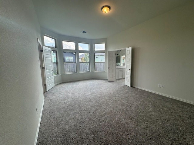 493 Sugar Cane Rd, Buda, TX 78610 - carpeted empty room with baseboards and a textured wall