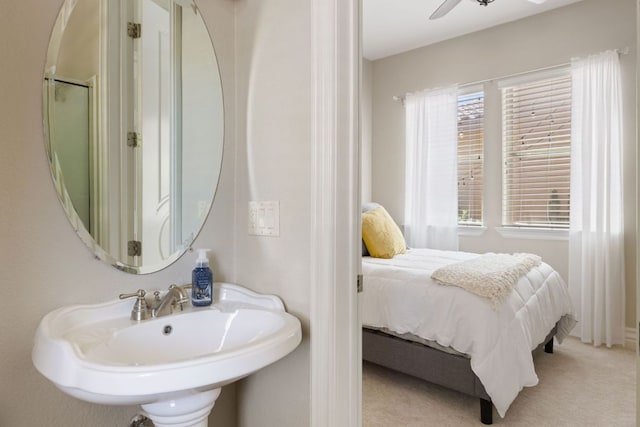 1306 High Lonesome, Leander, TX 78641 - ensuite bathroom featuring a sink and a ceiling fan