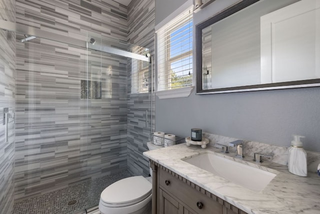 1306 High Lonesome, Leander, TX 78641 - full bathroom with vanity, a shower stall, and toilet