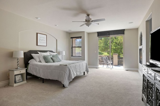 1306 High Lonesome, Leander, TX 78641 - bedroom with access to outside, light carpet, baseboards, and ceiling fan