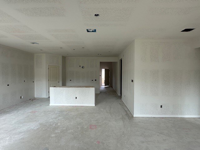 12402 Purple Prairie Ln, Buda, TX 78610 - unfurnished room with visible vents and unfinished concrete flooring