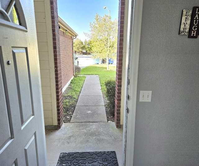 14400 Little Eagle Ct, Elgin, TX 78621 - exterior space featuring a textured wall and a wealth of natural light