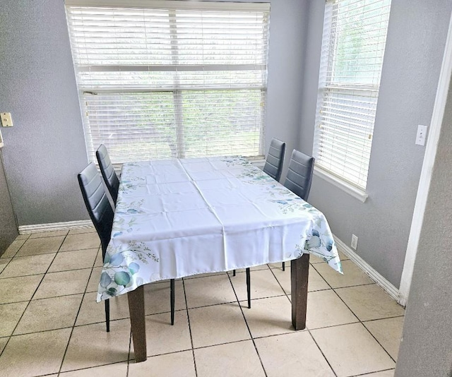 14400 Little Eagle Ct, Elgin, TX 78621 - tiled dining space with baseboards