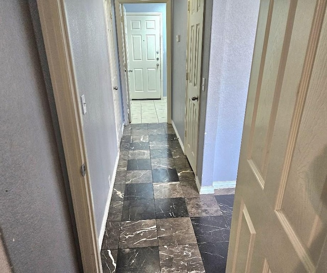 14400 Little Eagle Ct, Elgin, TX 78621 - hallway featuring baseboards