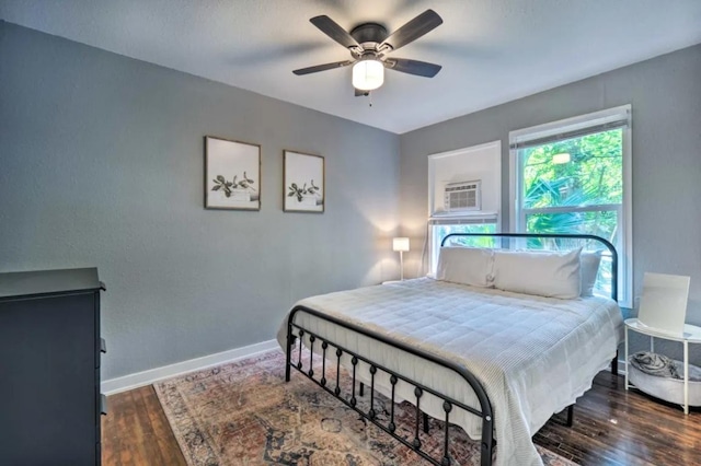 1026 Haynes St Unit 28, San Marcos, TX 78666 - bedroom featuring wood finished floors and a ceiling fan