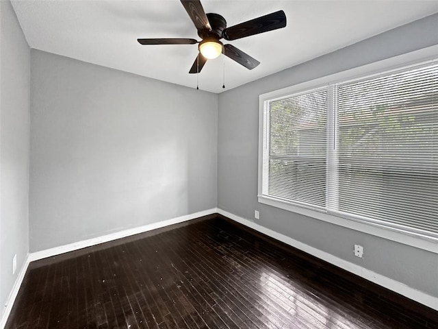 1026 Haynes St Unit 28, San Marcos, TX 78666 - empty room featuring dark wood finished floors and ceiling fan