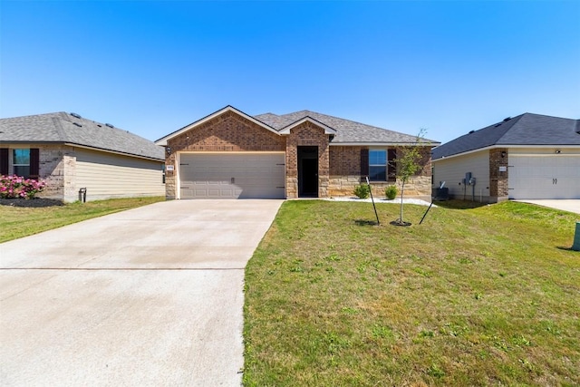 8516 Cantera Ridge Rd, Temple, TX 76502 - single story home featuring concrete driveway, a front yard, a garage, and brick siding