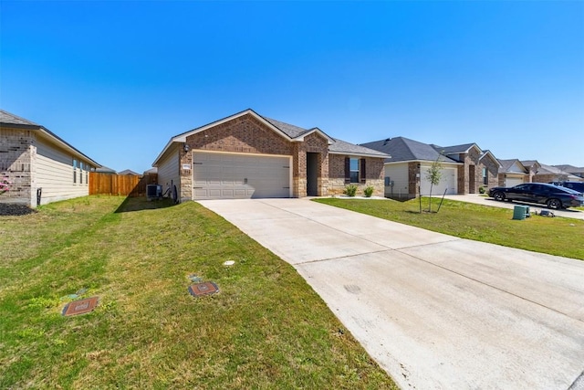 8516 Cantera Ridge Rd, Temple, TX 76502 - ranch-style house with an attached garage, driveway, stone siding, a residential view, and brick siding