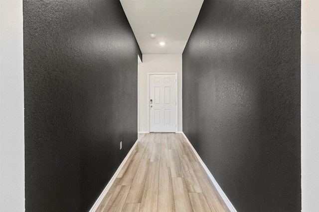 8516 Cantera Ridge Rd, Temple, TX 76502 - corridor with light wood-style flooring, baseboards, and a textured wall
