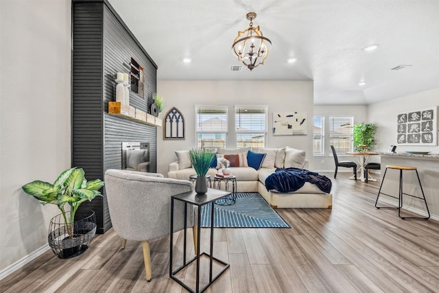 8516 Cantera Ridge Rd, Temple, TX 76502 - living area with wood finished floors, a chandelier, and recessed lighting