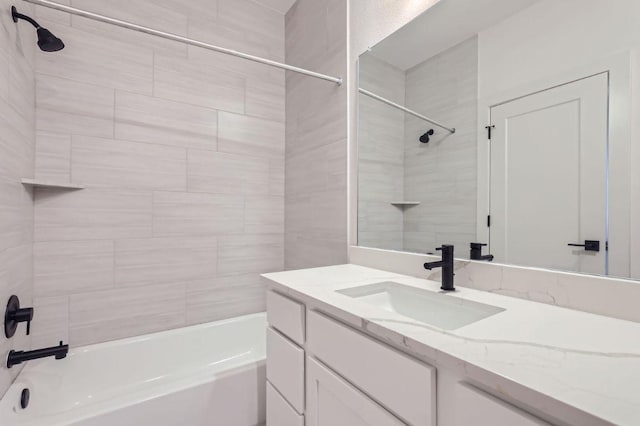 full bathroom featuring washtub / shower combination and vanity