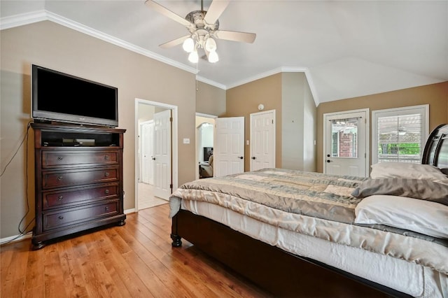 bedroom featuring lofted ceiling, light wood-style flooring, ceiling fan, crown molding, and baseboards