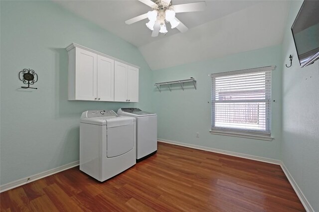 laundry room featuring washer and dryer, cabinet space, dark wood-style flooring, ceiling fan, and baseboards