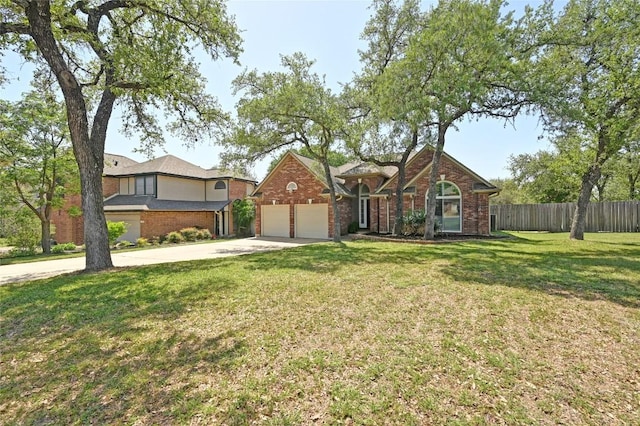 traditional-style house with a garage, concrete driveway, and brick siding