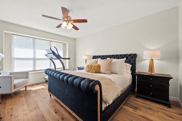 3420 Benecia Ct, Austin, TX 78738 - bedroom with hardwood / wood-style flooring and a ceiling fan