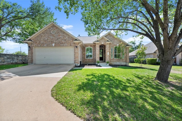 ranch-style house with brick siding, an attached garage, concrete driveway, and a front yard