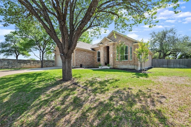 single story home featuring a garage, brick siding, and driveway