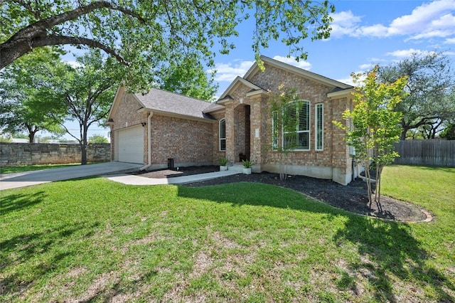 view of front facade with brick siding, an attached garage, and driveway