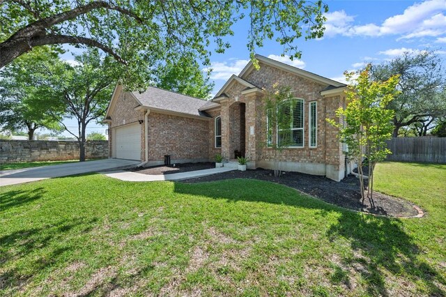 3420 Benecia Ct, Austin, TX 78738 - ranch-style house featuring brick siding, a garage, and driveway