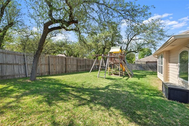 3420 Benecia Ct, Austin, TX 78738 - fenced backyard featuring a playground