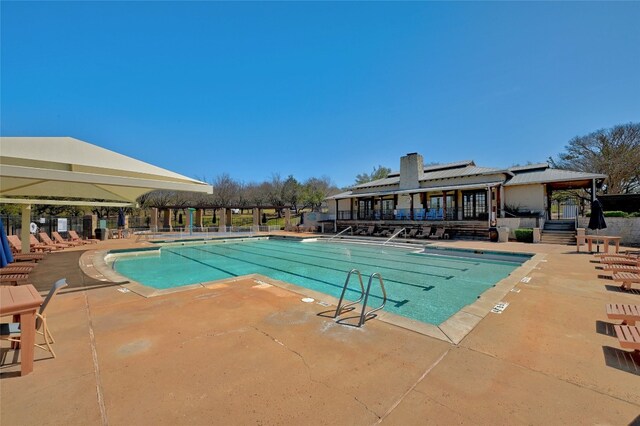 3420 Benecia Ct, Austin, TX 78738 - community pool featuring a patio area