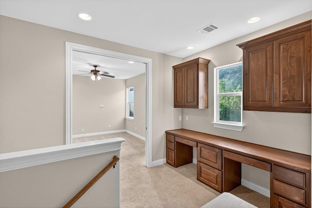 104 Double Cir, Burnet, TX 78611 - unfurnished office with built in desk, light carpet, recessed lighting, and ceiling fan