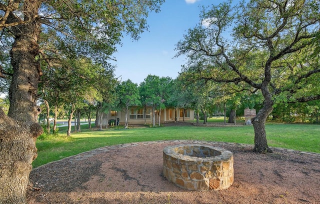104 Double Cir, Burnet, TX 78611 - view of grassy yard with an outdoor fire pit