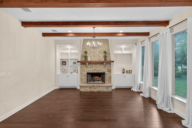 104 Double Cir, Burnet, TX 78611 - unfurnished living room featuring dark wood-style flooring, a fireplace, beamed ceiling, a chandelier, and recessed lighting