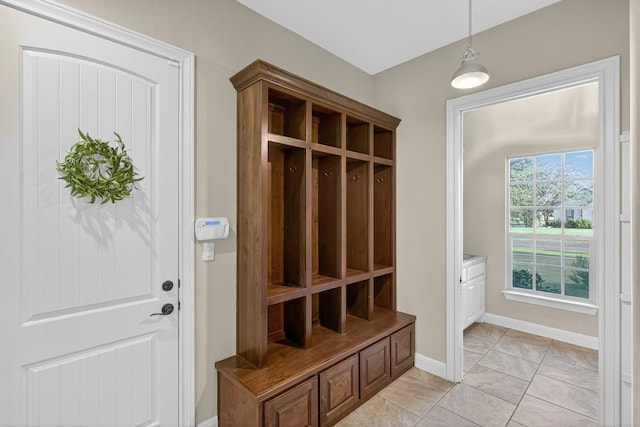 104 Double Cir, Burnet, TX 78611 - mudroom with baseboards and light marble finish floors