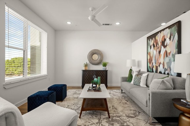 6324 N Lamar Blvd Unit 313, Austin, TX 78752 - living area featuring recessed lighting, light wood-style flooring, and a ceiling fan
