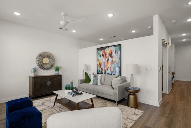 6324 N Lamar Blvd Unit 313, Austin, TX 78752 - living room featuring a barn door, wood finished floors, baseboards, recessed lighting, and a ceiling fan