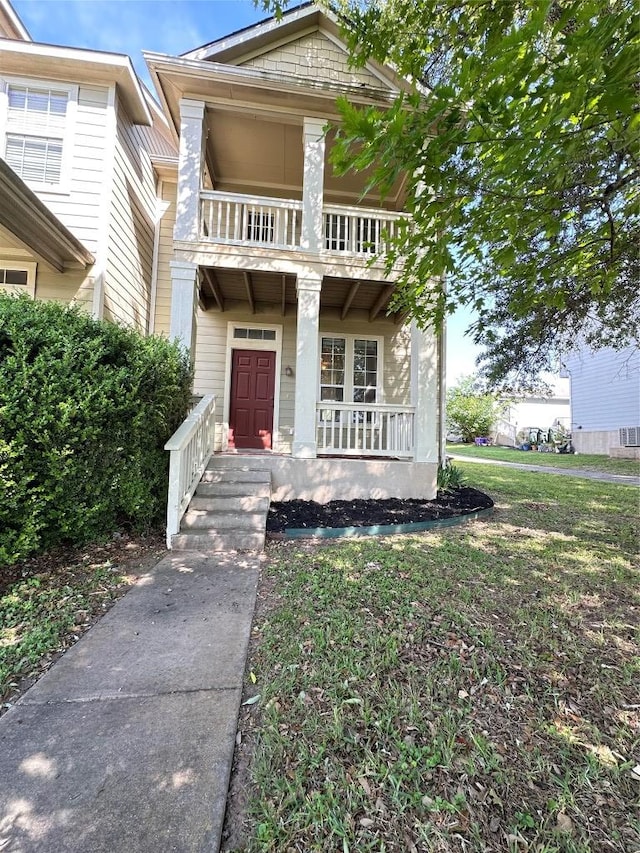 175A Michaelis Unit A, Kyle, TX 78640 - view of front of house featuring a balcony and covered porch