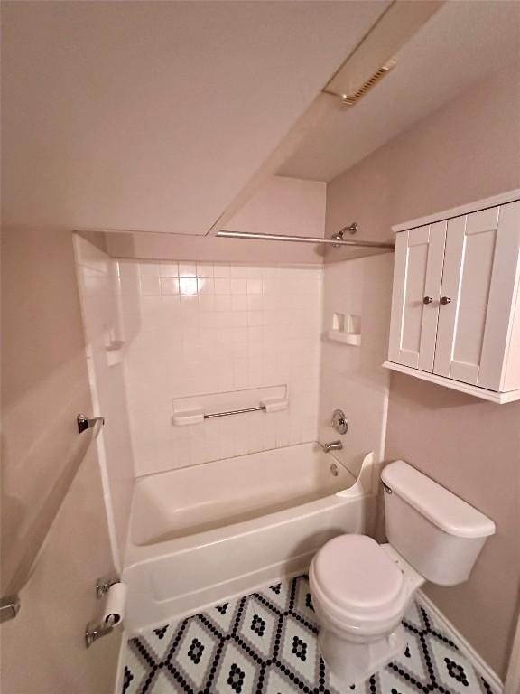 175A Michaelis Unit A, Kyle, TX 78640 - bathroom featuring shower / bathtub combination, toilet, and tile patterned flooring