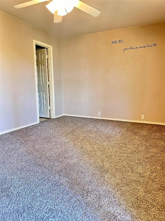 175A Michaelis Unit A, Kyle, TX 78640 - carpeted empty room featuring ceiling fan and baseboards
