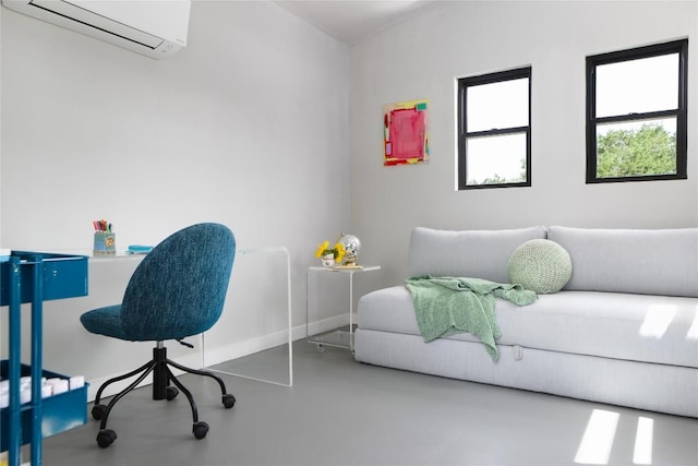 7817 Orisha Dr, Austin, TX 78739 - office featuring finished concrete floors, an AC wall unit, and baseboards