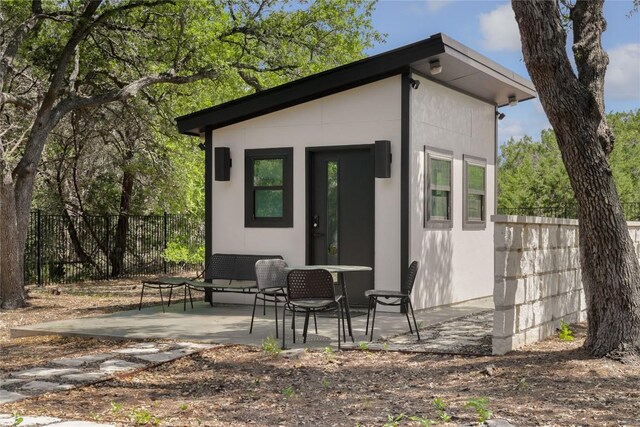 7817 Orisha Dr, Austin, TX 78739 - view of outbuilding with an outbuilding and fence
