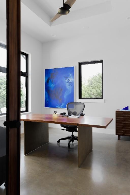 7817 Orisha Dr, Austin, TX 78739 - office area with finished concrete floors and baseboards