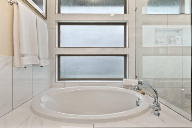 bathroom featuring a bath