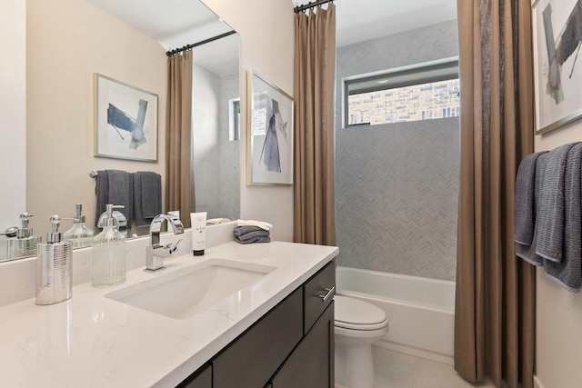 full bath featuring tile patterned flooring, toilet, shower / tub combination, and vanity