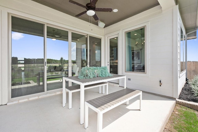 view of patio featuring ceiling fan