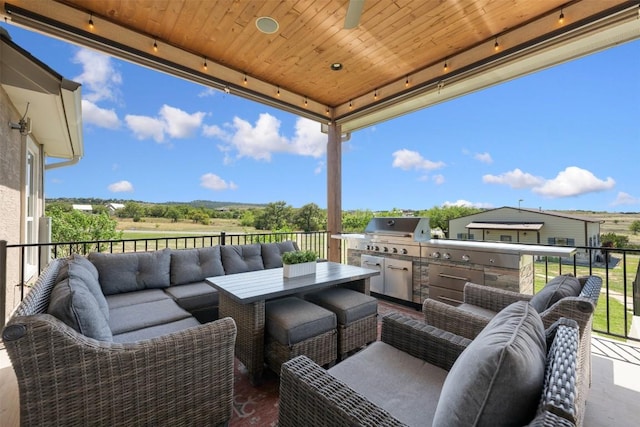 view of patio featuring a grill and an outdoor hangout area