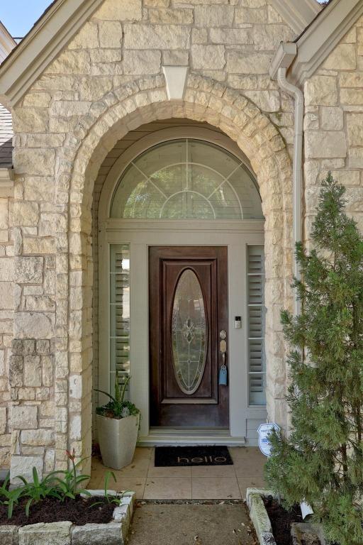 8909 Beatty Ct, Austin, TX 78749 - entrance to property featuring stone siding