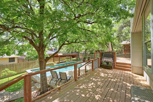 8909 Beatty Ct, Austin, TX 78749 - wooden deck featuring a fenced backyard