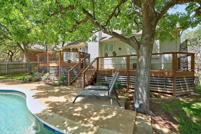 8909 Beatty Ct, Austin, TX 78749 - back of property with stairs, a deck, and a patio