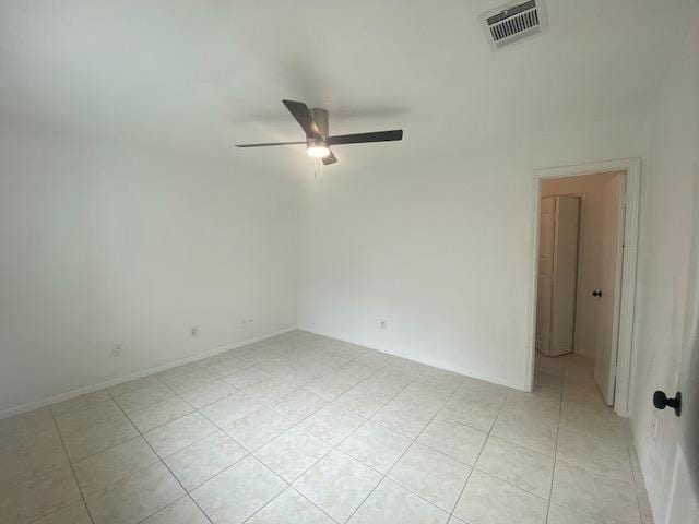 12318 Marogot Run, Austin, TX 78758 - empty room with ceiling fan and light tile patterned flooring