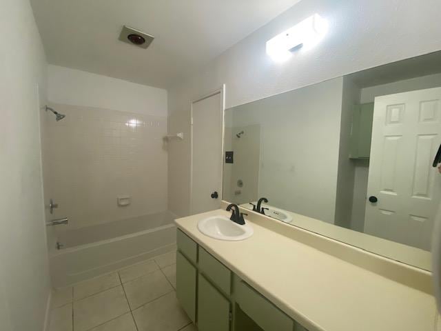 12318 Marogot Run, Austin, TX 78758 - bathroom featuring tile patterned flooring, vanity, and bathtub / shower combination