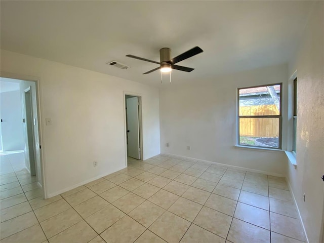 12318 Marogot Run, Austin, TX 78758 - unfurnished room with light tile patterned floors and ceiling fan