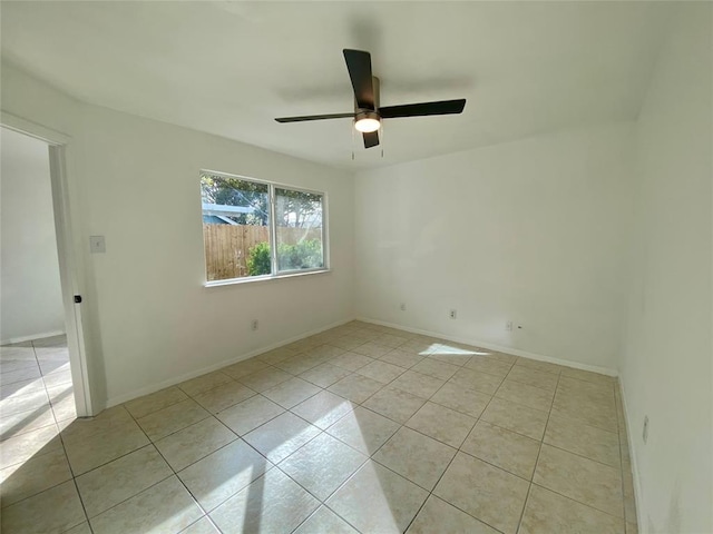 12318 Marogot Run, Austin, TX 78758 - empty room featuring light tile patterned floors and a ceiling fan